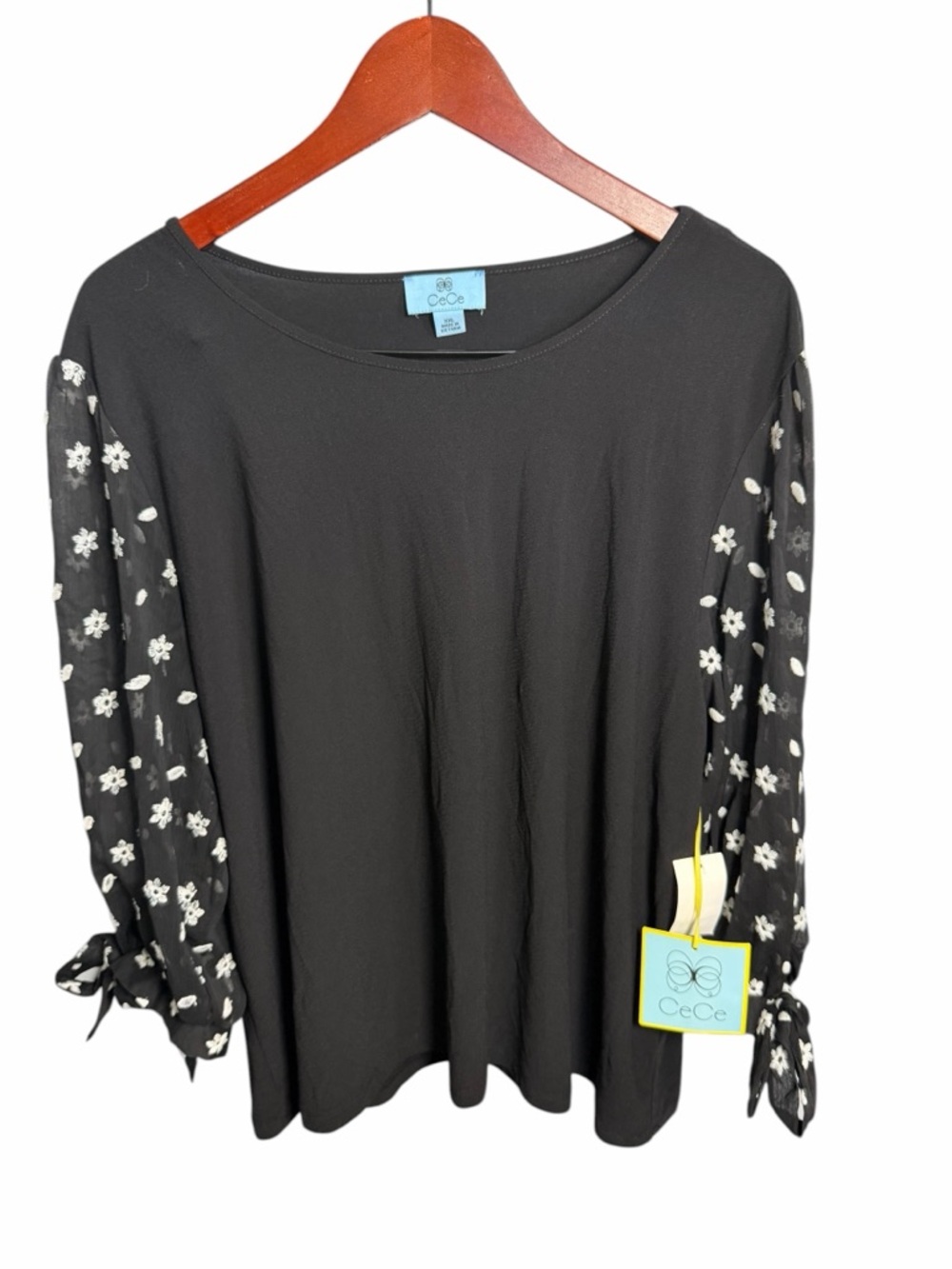 CeCe Black Blouse with White Floral Sheer Sleeves and Tie Cuffs